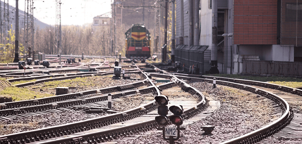 Train on Tracks Leaving Train Yard